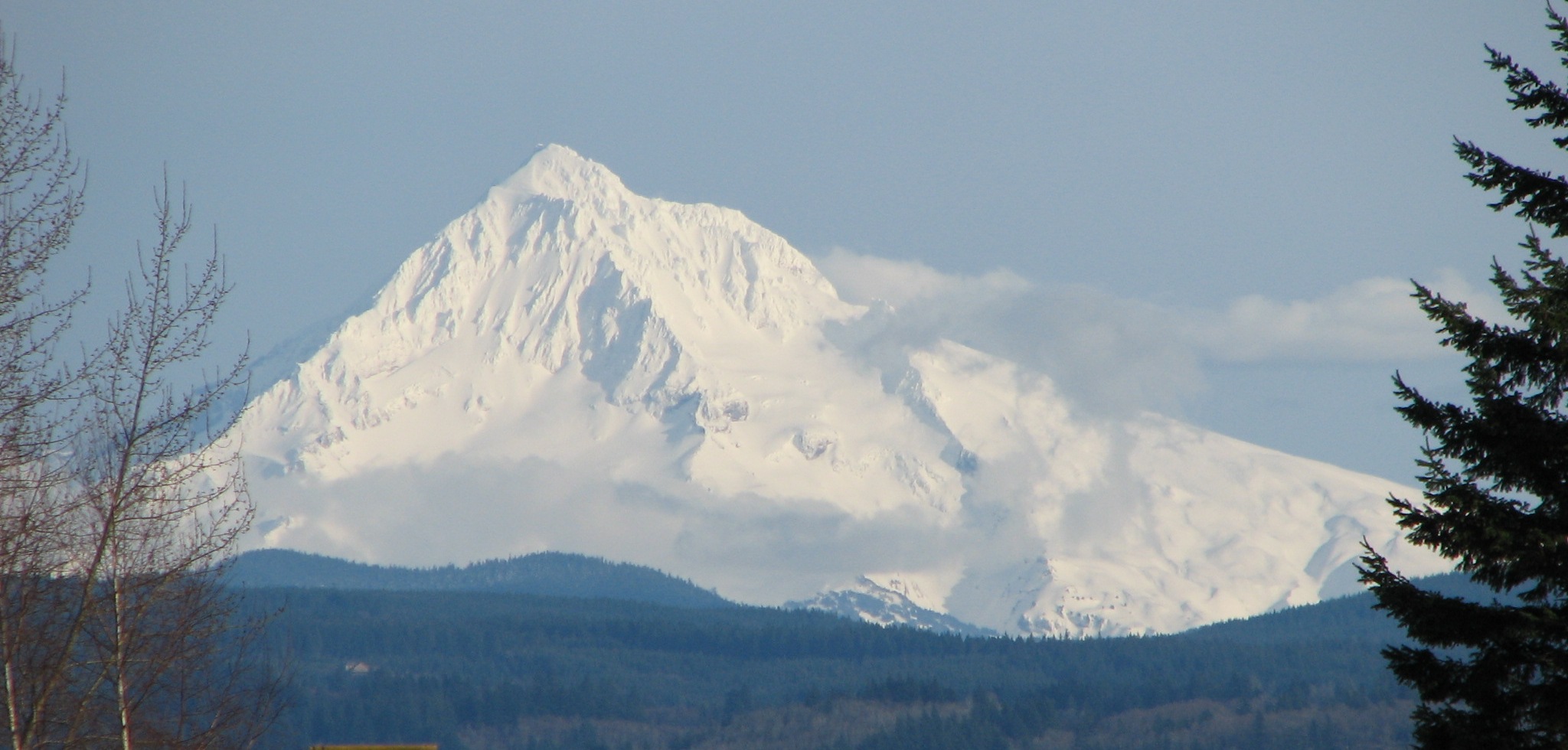 Aerial view of Mount Hood's snow-covered peak in Oregon